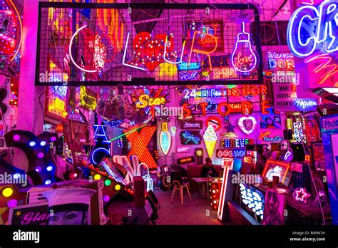 Room Full Of Bright Colourful Neon Signs Neon Shop Gods Own Junkyard