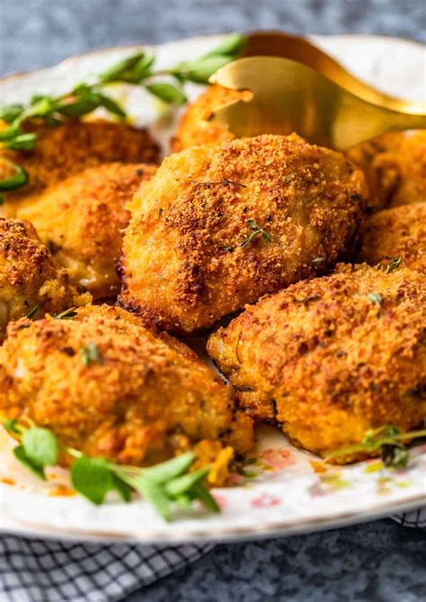Lightly brush the butter onto the chicken, then dip into breadcrumb mixture. Parmesan Crusted Chicken (Oven Fried) - Easy Chicken ...
