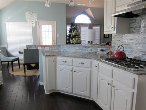 Volga blue granite countertops with cherry wood cabinetry. kitchen countertops and backsplashes - Bing Images ...