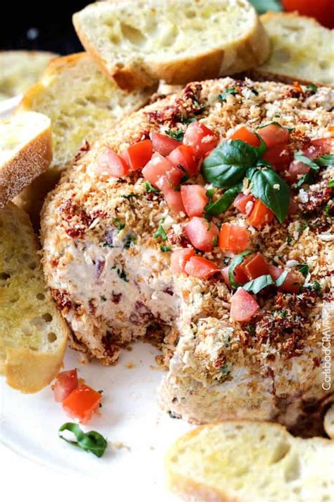 Spoon over the goat cheese topped bruschetta. easy Bruschetta Cheese Ball (with Video!) - Carlsbad Cravings