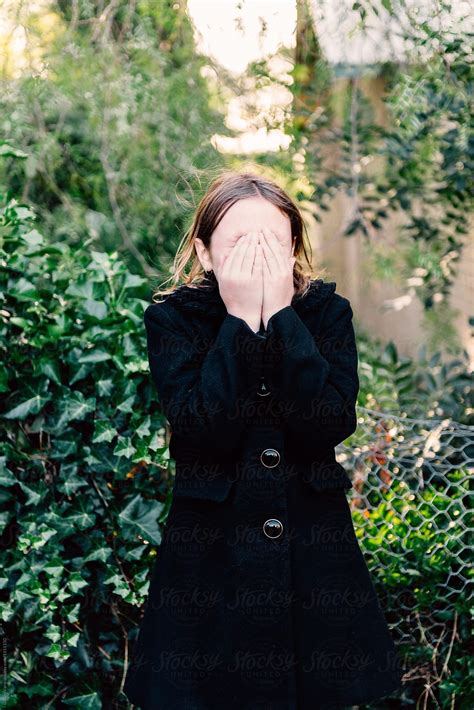 Tween Girl Covering Her Face With Her Hands By Stocksy Contributor Gillian Vann Stocksy