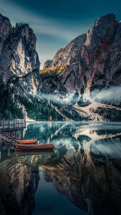 Download Lake Boats Pier Mountains Reflections Nature 2160x3840