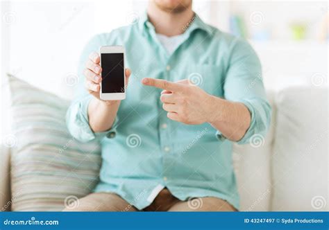 Close Up Of Man Sitting With Smartphone At Home Stock Image Image Of Gadget Black