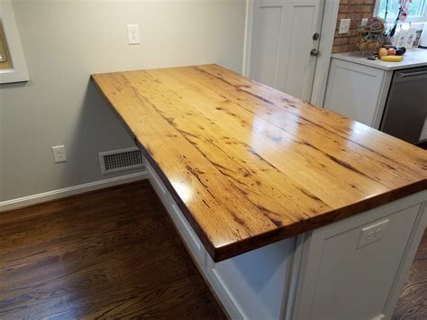 This is a lovely reclaimed wood slab coffee table with metal legs. Maintaining Your New Wood Slab Kitchen Countertops
