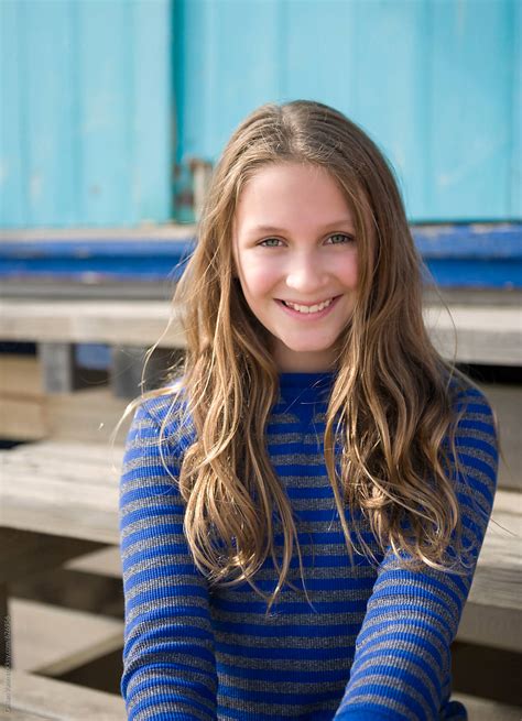 Portrait Of A Pretty Almost Teenager Girl With Long Hair By Stocksy