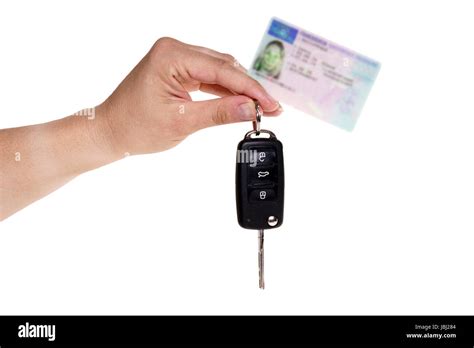 Hand Holding Car Key And Drivers License Stock Photo Alamy