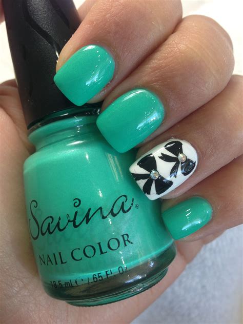 mint green and white nails with black bow design savina nail polish blue for you spring nail