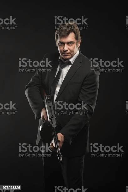 Handsome Middle Aged Man Gangster With Thompson Machine Gun Stock Photo