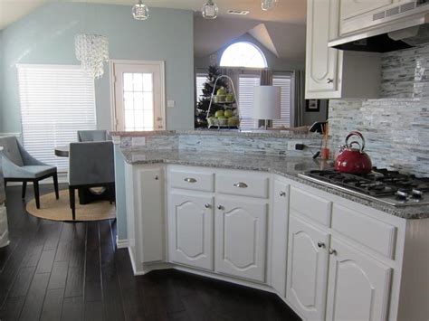 In this example by interior designer grant k. 25 Elegant Kitchens with Hardwood Floors