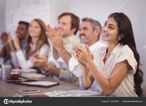Business people applauding during presentation — Stock ...