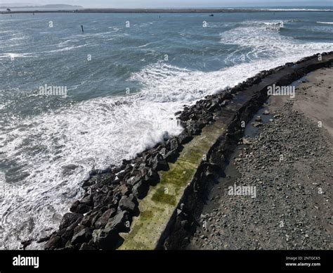 Waves Breaking Over The Rocks Stock Photo Alamy