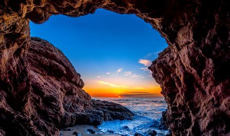 Download Horizon Sun Sunset Sea Ocean Beach Nature Cave Hd Wallpaper