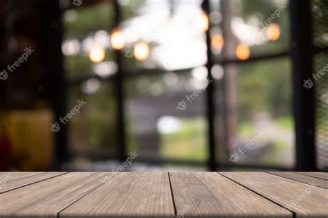 Premium Photo Wooden Table On Front Blurred Background