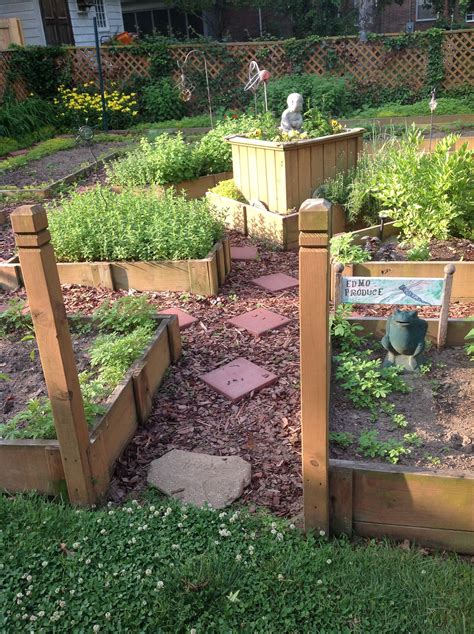 Lay it out where you would like your garden bed to be. Raised Bed Garden May 2014 | Garden paths, Raised garden ...
