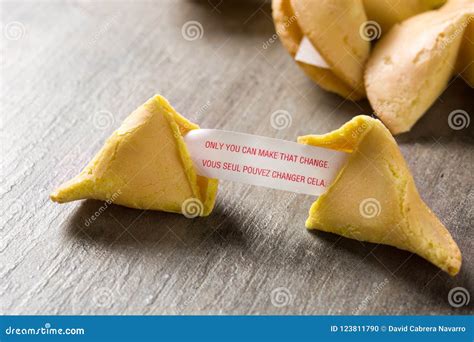 Fortune Cookie With Message On Paper On Wood Stock Photo Image Of