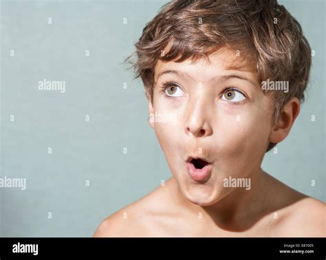 Amazed 7 Years Old Boy Make Funny Faces Stock Photo Alamy