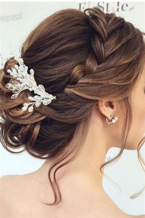 If you're looking for a hairstyle to wear to a wedding then we've got some great ideas for you! Bridesmaid Updo Hairstyles Long Hair - OOSILE