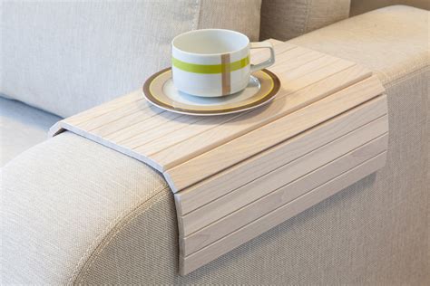 This sofa is robust and warm. Flexible Wooden Sofa Armrest Tray Table