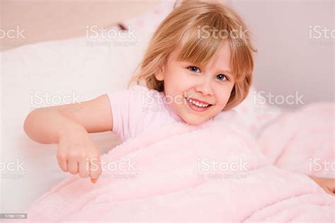 Child Waking Up In Bed Stock Photo Download Image Now Beautiful
