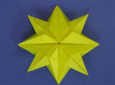 Take the top left and right corners and bring them into the. How to Make an Origami Christmas Star « Origami :: WonderHowTo