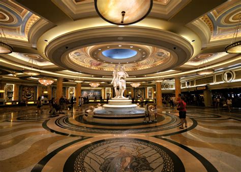 Blackjack, slot machine, roulette, video poker, and. File:Caesars Palace lobby.jpg