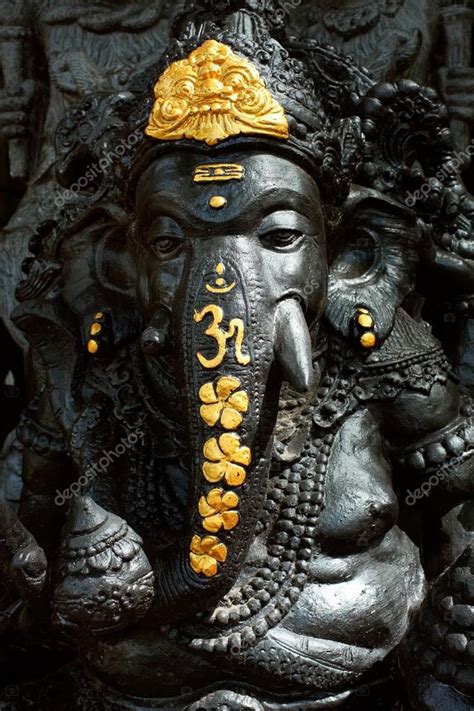 Hand Carved Stone Statue Of The Hindu Elephant God Ganesh Waits For A