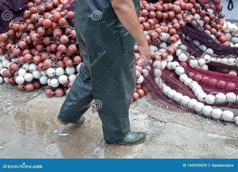 Fishermans Legs And Fishing Nets With Floaters Stock Image Image Of