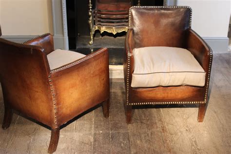 The stone & beam lauren leather armchair comes fully assembled, with a hardwood frame, down filling, and removable cushions and covers. Wonderful pair of Small 1920s French Studded Leather ...