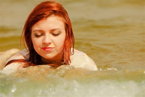 Redhead Woman Posing In Water During Summertime Stock Image Image Of Plus Swimming 90891047
