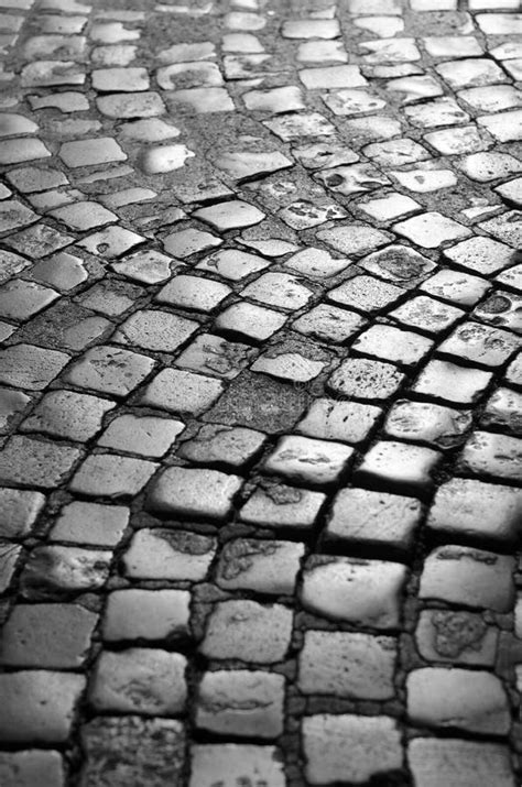 A Curved Pattern Of Cobblestones On A Street Stock Image Image Of