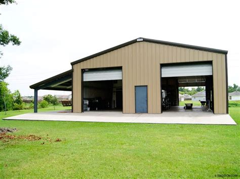 Steel Garage Building With Two High Overhead Doors And A Lean To On The