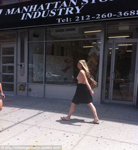 mystery topless woman walking through streets of new york and now surprise surprise she s