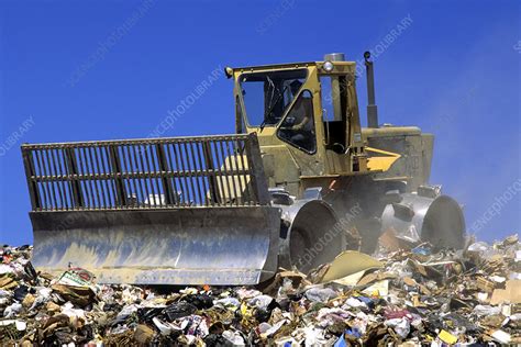 Bulldozer In A Landfill Stock Image C0010231 Science Photo Library