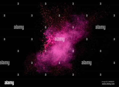 Closeup Of A Colorful Dust Particle Explosion Isolated On Black