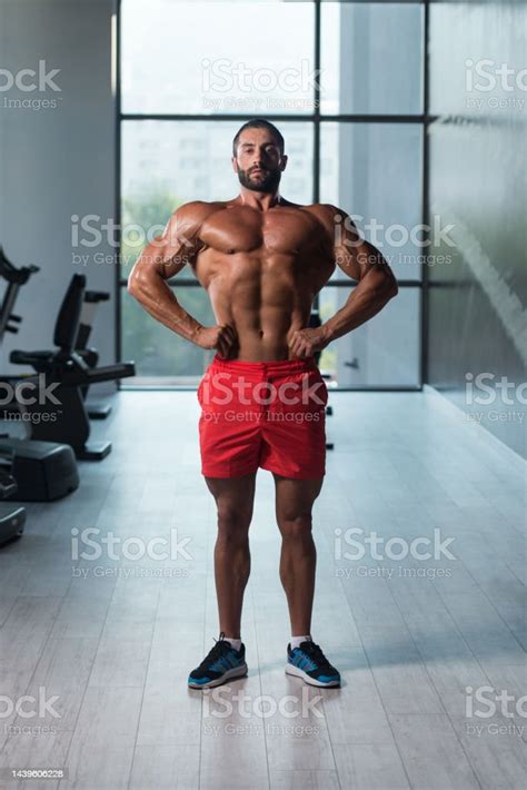 Bodybuilder Performing Front Lat Spread Pose Stock Photo Download