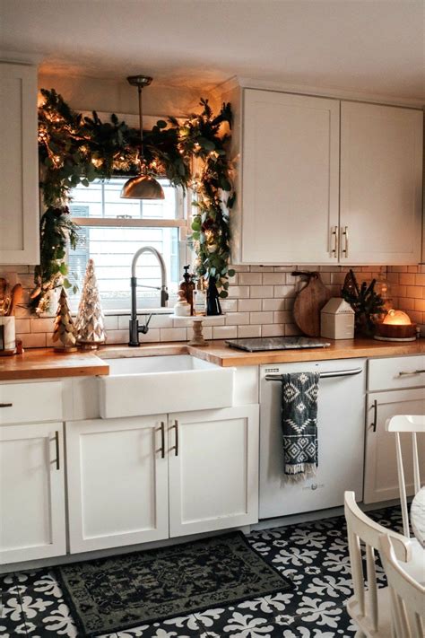 Love the candles and garland i might have to change up my. Make your Kitchen Magical- Christmas Kitchen Garland and Kitchen Favorites | Kitchen decor ...