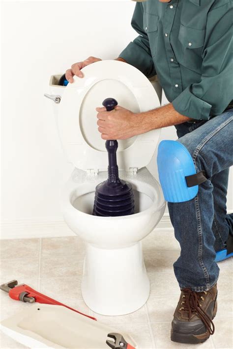 The Worker With A Plunger Stock Photo Image Of Janitor 30840604