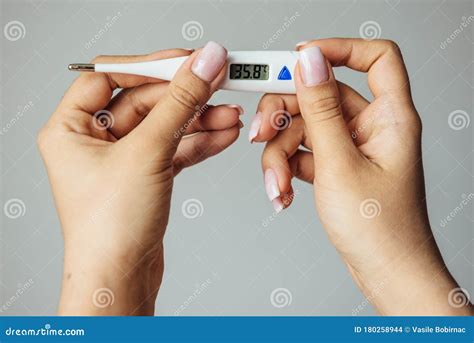 Hands With Thermometer Stock Photo Image Of Temperature 180258944
