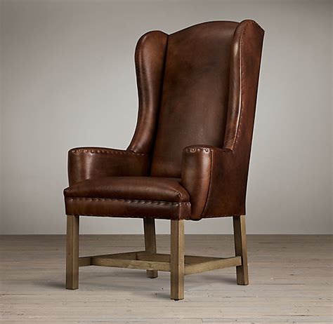 Neutral color fabric upholstery compliments the color and décor of any room. Belfort Wingback Leather Armchair