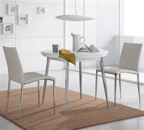 A partir de su diseño y su estilo se adecuan el resto de los muebles. casas, cocinas, mueble: Mesa extensible redonda