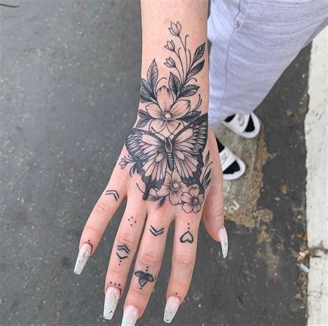hand and finger tattoos pretty hand tattoos finger tattoo for women pretty tattoos for women