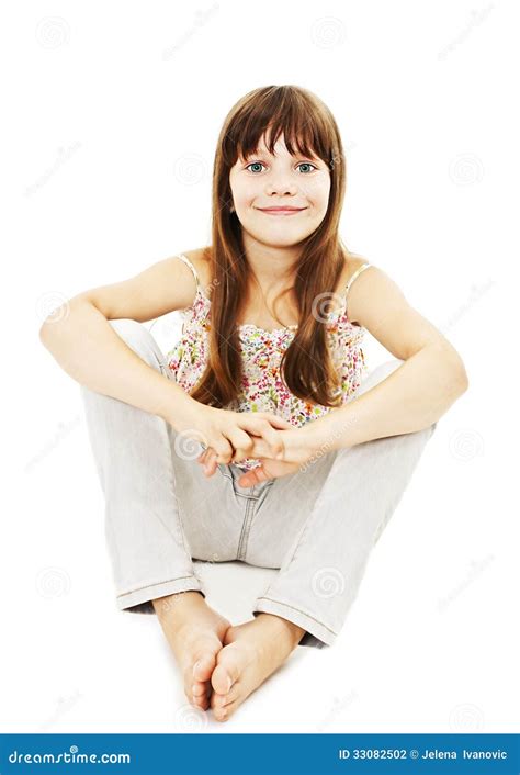 Pretty Little Girl Sitting On The Floor In Jeans Stock Photo Image Of