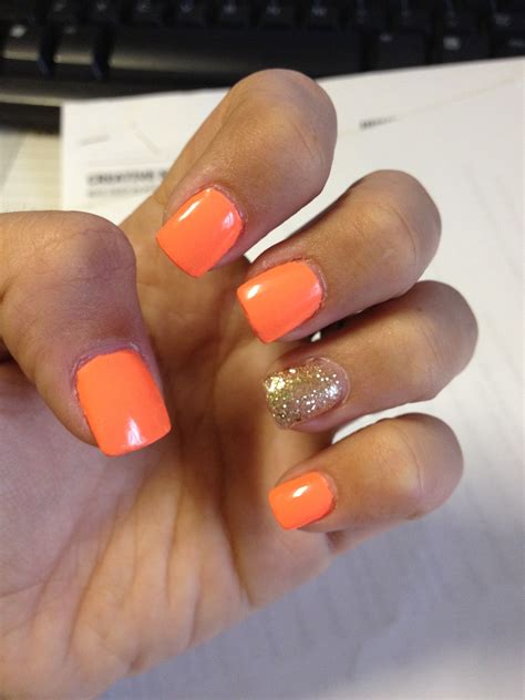 Neon Orange With Gold Glitter Gel Nails Orange Acrylic Nails Glitter