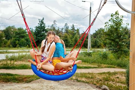 Best Girlfriends Ride On A Swing High Quality People Images ~ Creative Market