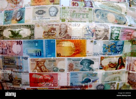A Collection Of Paper Notes From Different Countries And Currencies