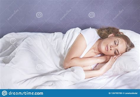 Beautiful Girl Sleeps In The Bedroom Lying On Bed Stock Image Image Of Happy Cute 126795789