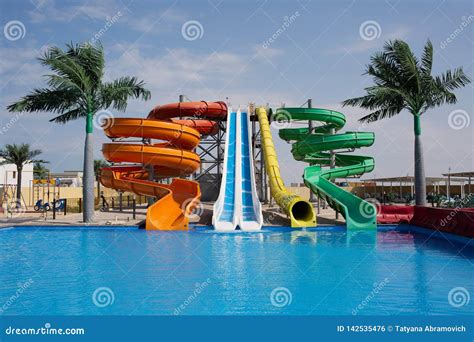 Multicoloured Big Water Slide In The Public Swimming Pool Stock Photo