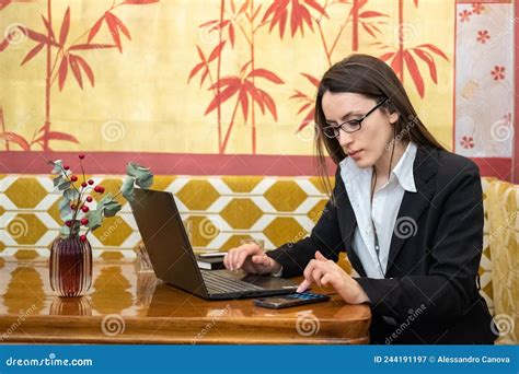 a woman works on her pc during her lunch break stock image image of digital lunch 244191197