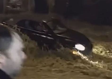 Video Woman Trapped In Car During Flash Flood Arabian Business