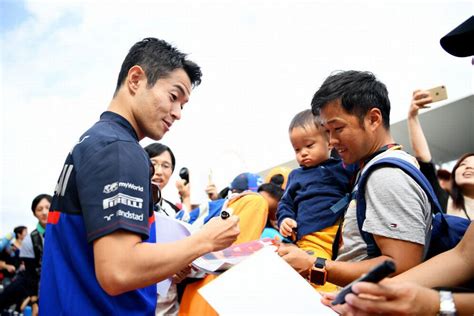 Naoki Yamamoto Signs Autographs For Fans In The Pitlane Formula Photos ESPN Co Uk